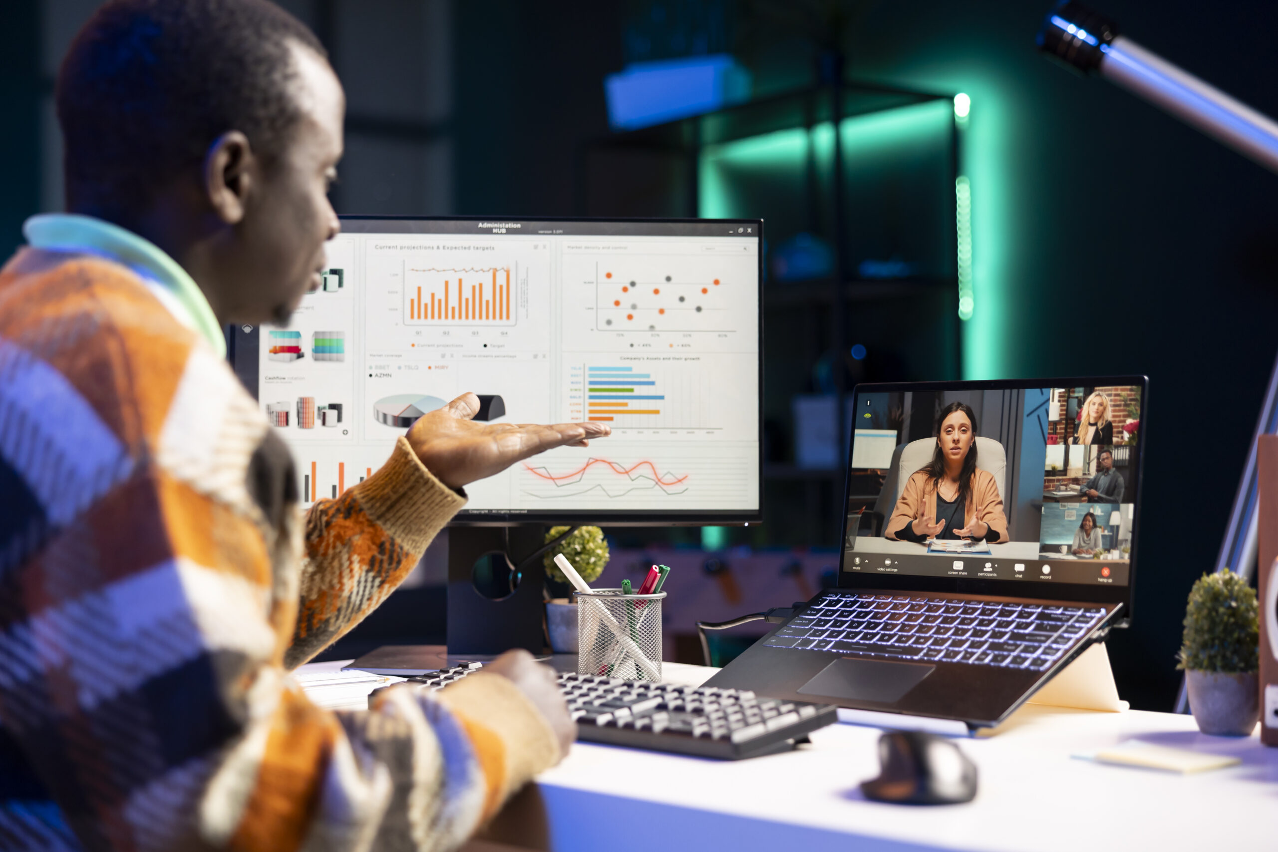 young adult employee attends a meeting on video conference